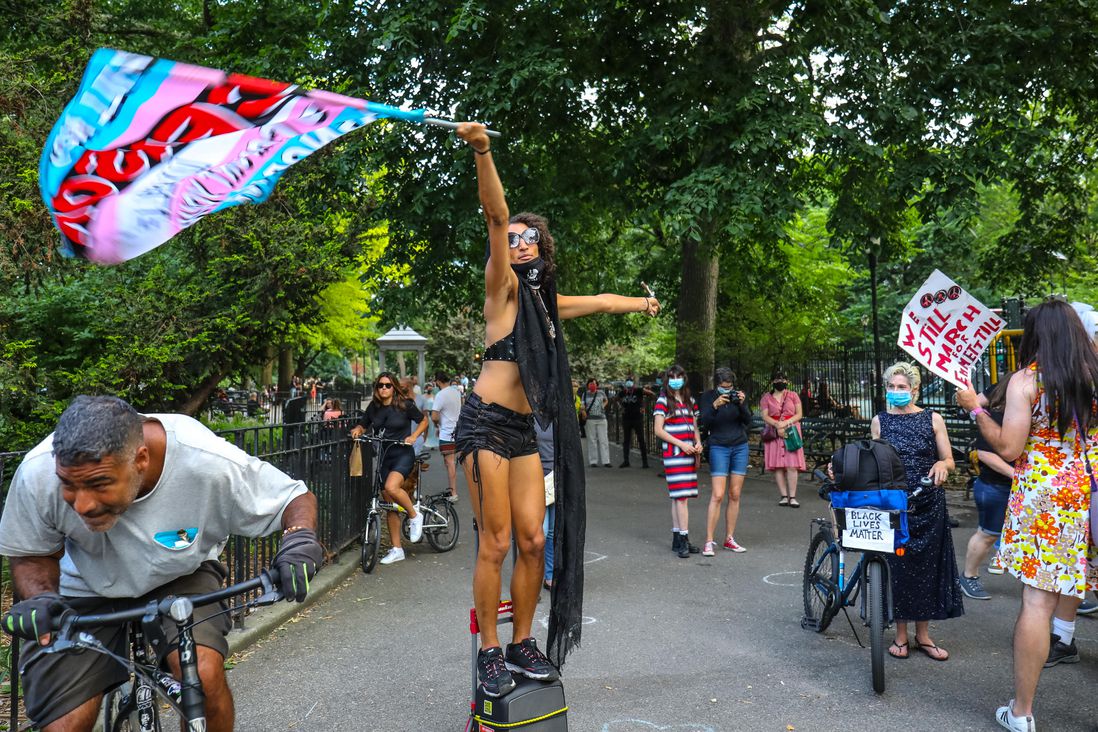 Scenes of men and women participating in the 2020 Drag March through Greenwich Village